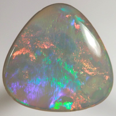 SOLID SEMI BLACK OPAL Large rolling flashes of neon red over green SEE VIDEO  